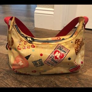 Harajuku Lovers crescent shaped handbag.